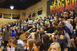 John Carroll fans cheer on the girls varisty basketball team during the game against St. Pauls.