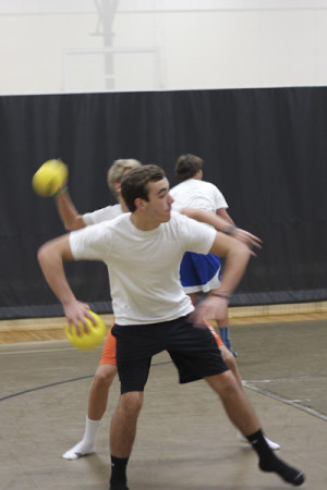 Freshman Nate LeBuhn winds up to throw a dodge ball.  Freshman play dodge ball in Athletic Trainer Erik Fabrizianis class often. 