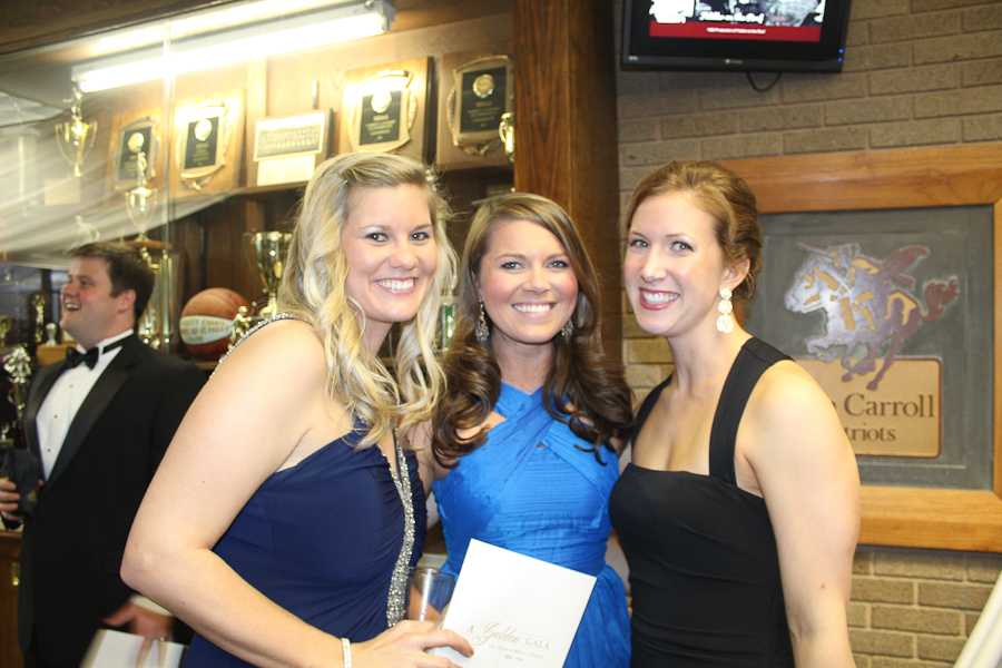 Emily Boyle and Caitlin Little, class of 04,  and Molly Housman, class of 05, pose at the 50th Anniversary Golden Gala. The event was held on April 26.