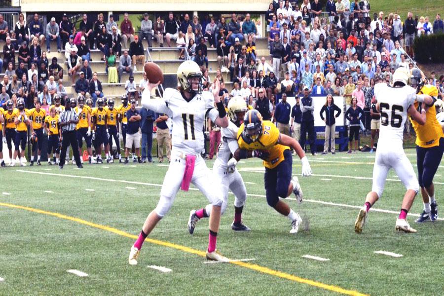 Junior quarterback Kurt Rawlings drops back for a pass against St. Pauls. John Carroll lost 22-21 on Oct. 3, their record now standing at 2-3.