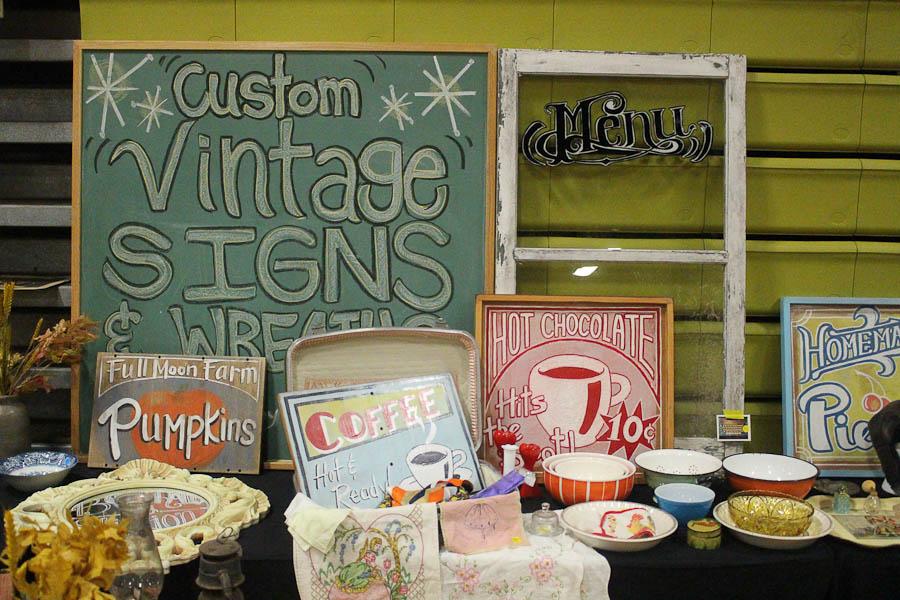 1) Custom vintage signs are being displayed at the vintage sale. The sale was held in the upper gym on Nov. 1 from 11am to 4pm.
