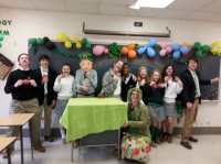 Advisories pose for St. Patrick’s Day contest