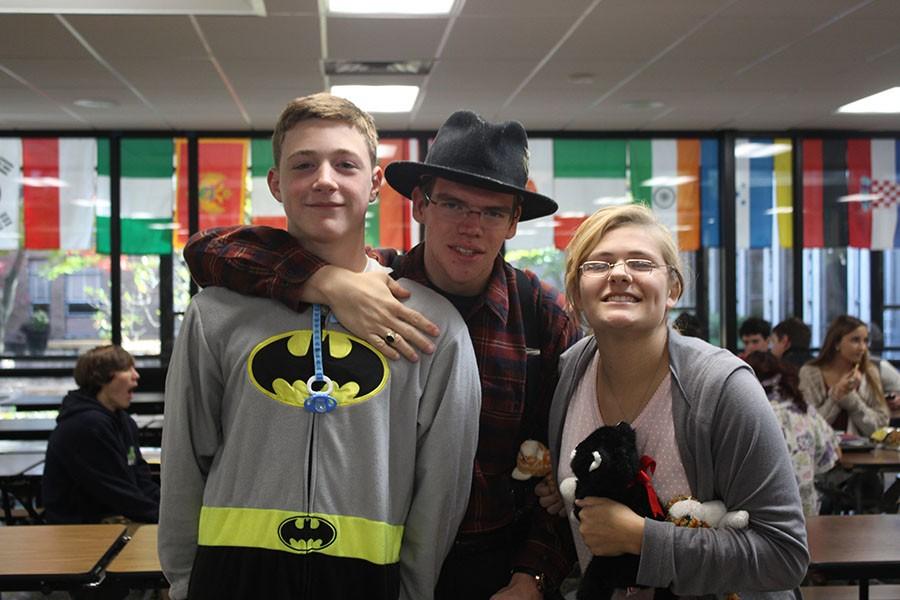 Freshman Zach Haskell and seniors Patrick Luft and Madison Hooper dress in their appropriate attire for Ages Day. On Ages Day, freshmen dressed as babies, sophomores as teenagers, juniors as working-class adults, and seniors as senior citizens.