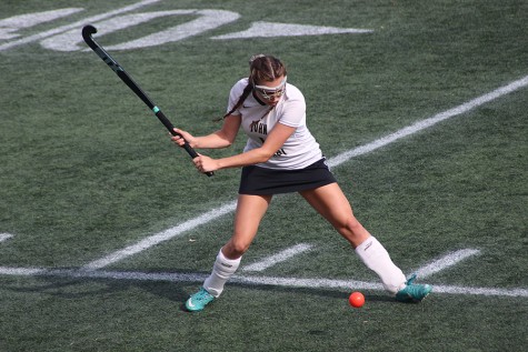 Senior captain and right midfielder Carly Lyon passes the ball toward the middle of the field. Lyon along with her fellow captains were instrumental in capturing back-to-back championships.