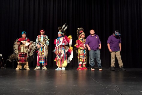 Students from St. Labre Indian School take the stage after a brief presentation about traditional Native American music and dance styles. Dancers and drum group members performed in The Morning Star Powwow on Jan. 9. 
