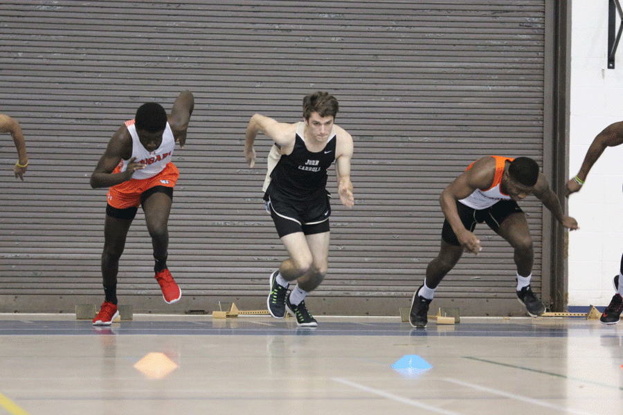 Senior sprinter Jake Bowling takes off in the 55 meter dash race. Bowling and other seniors led the team to a fifth place finish in the MIAA. 