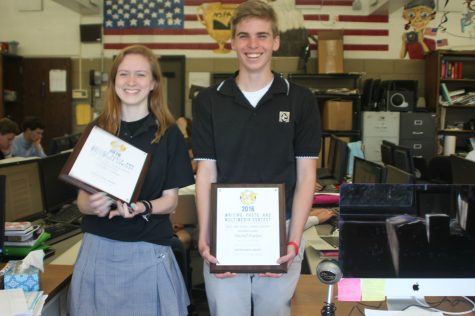 Junior Caroline Cooney and senior Mitch Hopkins pose with Quill and Scroll Sweepstakes awards, which recognizes journalistic excellence. Cooney was awarded for her work on the staff editorial Islam deserves understanding, and Hopkins was awarded for his work on front page design. 
