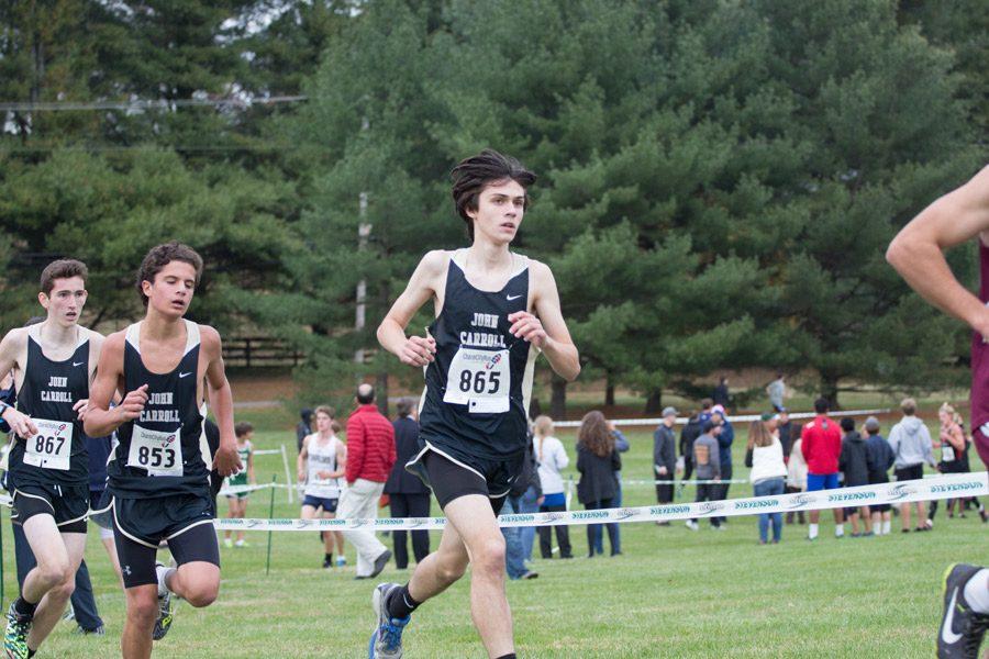 Sophomore Jack Plumer races in the cross country championships at Stevenson University on Nov. 1. The team finished in second place with a score of 60 points in the varsity B Conference.