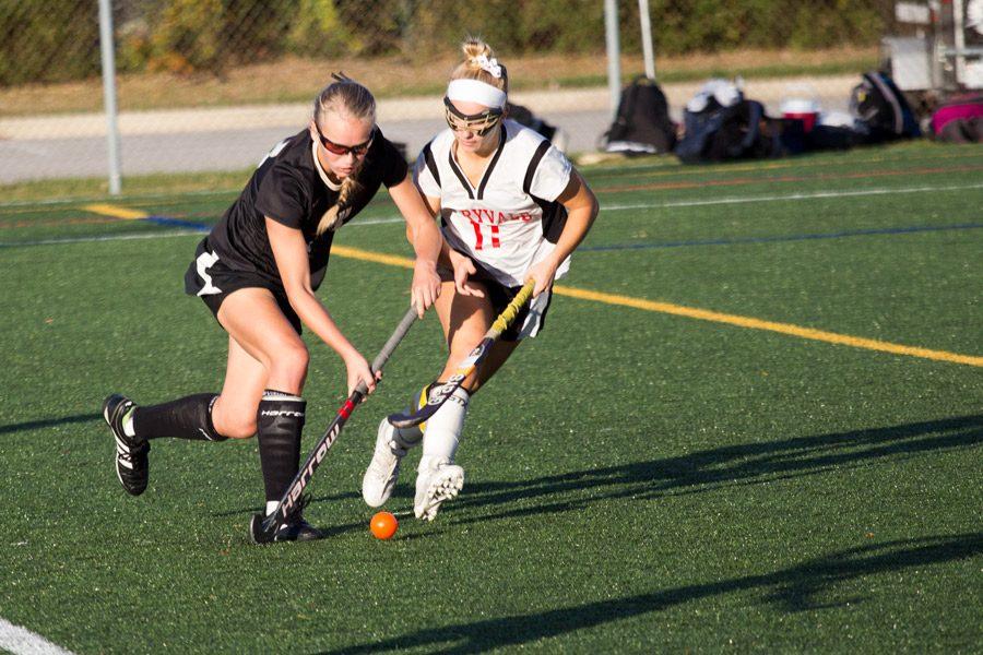 Junior left midfielder Ashlee Kothenbeutel fights to keep the ball away from a Maryvale defender as she drives the ball closer to the goal. Throughout the season, Kothenbeutel scored seven goals, making her the second highest scorer on the team.