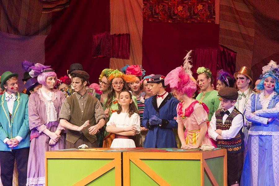 The cast of Mary Poppins gathers around Mary as she chooses letters in order to spell out supercalifragilisticexpialidocious. Mary Poppins will be showing at 7 p.m. on Nov. 4 and 5, and at 2 p.m. on Nov. 5 and 6.