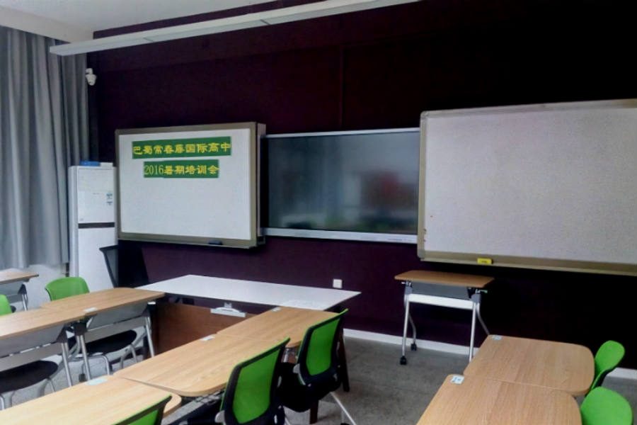 This is one of the standard classrooms used by the John Carroll School of Chongqing. There are currently 40 Chinese tenth graders, three American teachers, and 16 Chinese teachers.