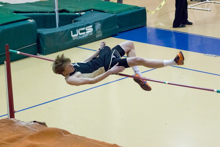 Clearing his second attempt, senior Iain Olsen beats his personal record in the high jump with a height of 54. The mens indoor track and field team competed in an MIAA meet at Loyola Blakefield on Thursday, Dec. 8.