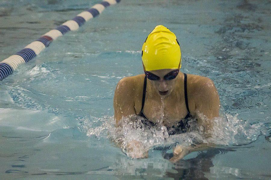 Junior Amelia Wickham leads the womens 200m Individual Medley as she approaches the wall during the breaststroke leg of the race. Wickham finished in first place in the 200m IM and second place in the 100m breaststroke. 