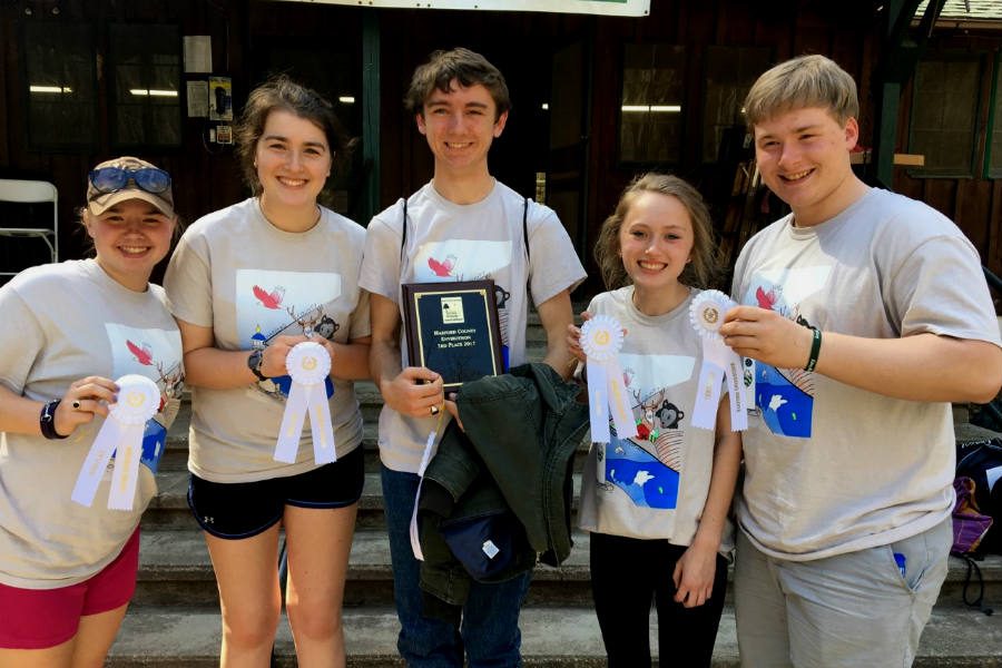 Seniors Mary Olsen, Elizabeth Butz, Edward Benner, Erica Deyesu, and Caleb Olsen pose with their awards from the Harford County Envirothon competition at Rocks State Park. The A Team won third place for the second consecutive year.