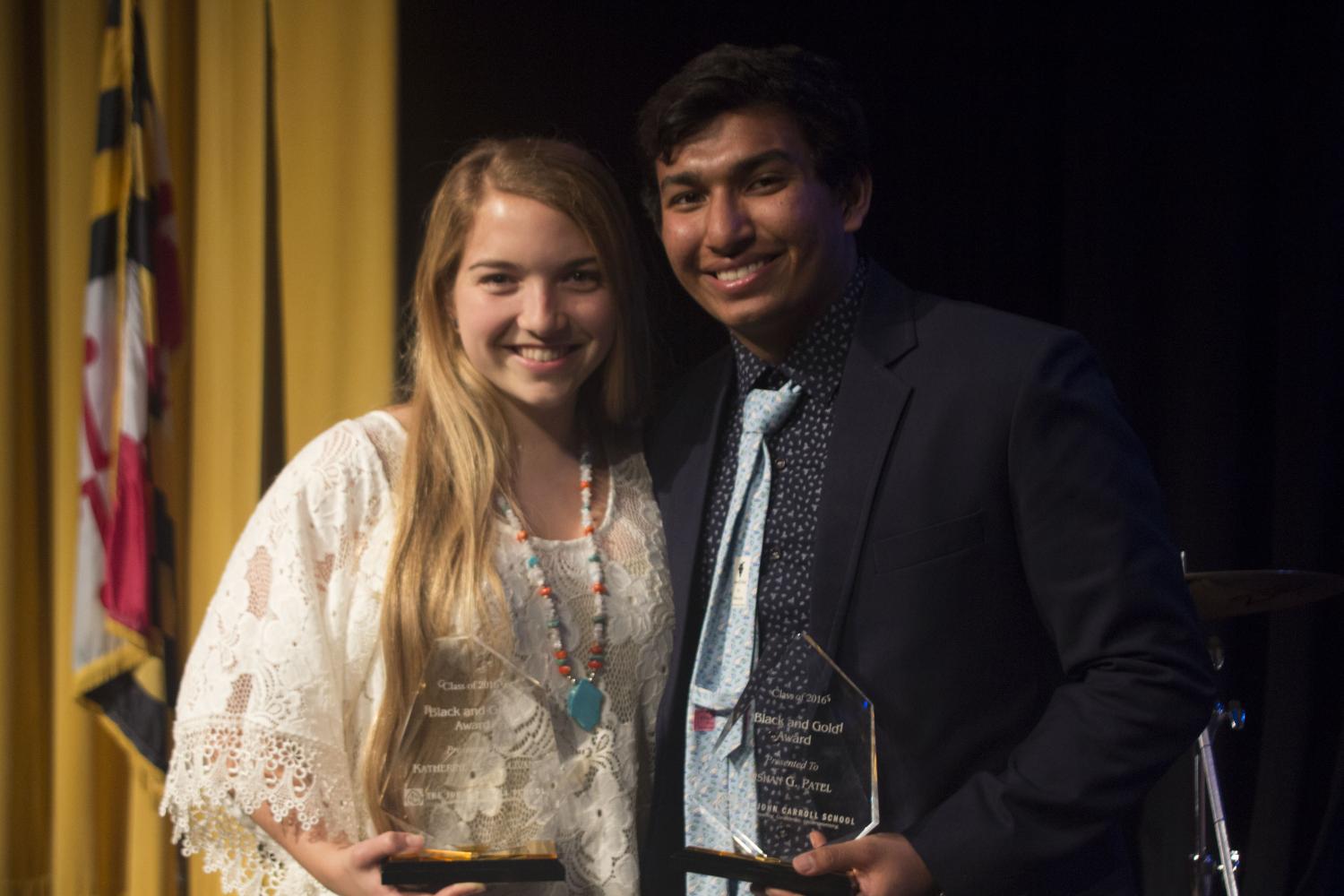 Katie Sullivan and Kishan Patel, class of '16, pose with their Black & Gold Award, which is presented to one male and one female student in the graduating senior class. This year, the nominees are seniors Caroline Cooney, Emma Gromacki, Pia Scotto, Emily Stancliff, Edward Benner, Nicholas Hinke, Caleb Olsen, and Daniel Robinson.
