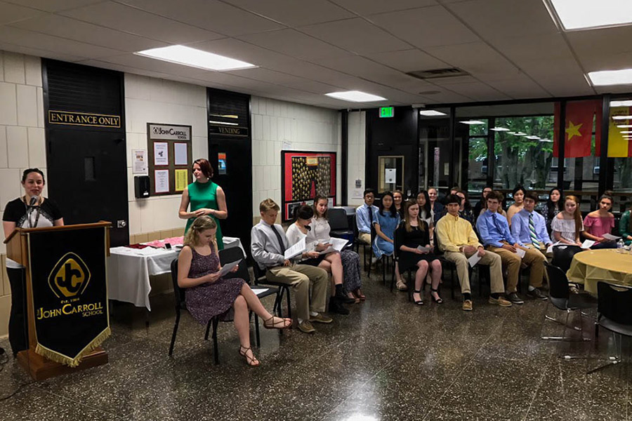 New members of the Tri-M Music Honors Society listen to Performing Arts Department Chair Julie Parrish speak before they are inducted at the Music Awards Banquet on Wednesday, April 26. The graduating members of the Tri-M Music Honors Society were also recognized and received their graduation cords.