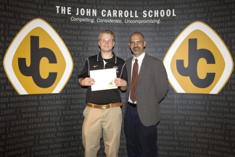 Junior Ryan Griffin was awarded the Jim Chrismer Excellence US History Award by social studies teacher Jake Hollin. Griffin was one of the few juniors honored at the Senior Award Ceremony on May 18. 
