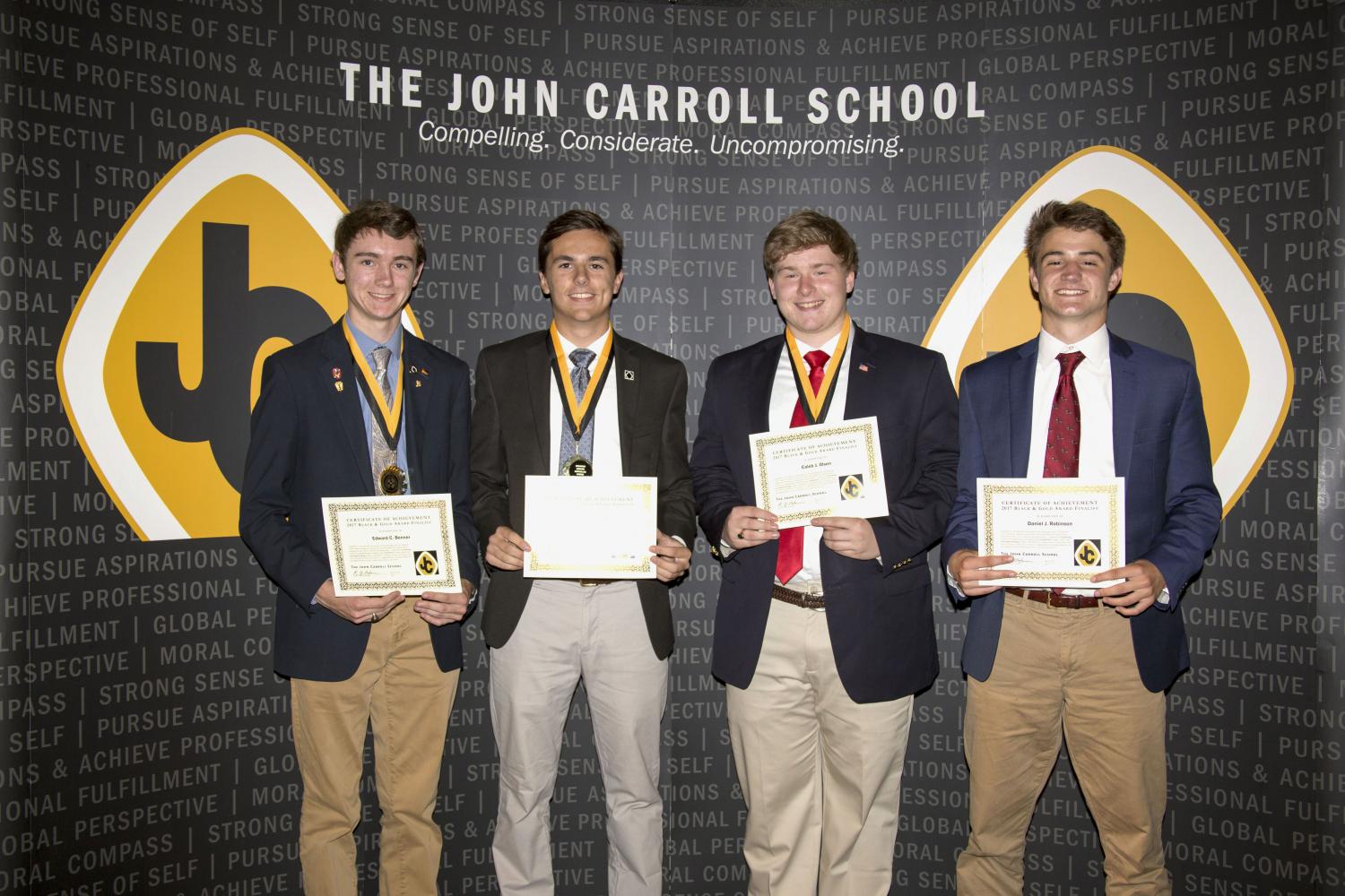 The finalists for the mens Black and Gold award pose together. Seniors Edward Benner, Nick Hinke, Caleb Olsen, and Daniel Robinson (left to right). The winner will be announced on Wednesday, May 24. 