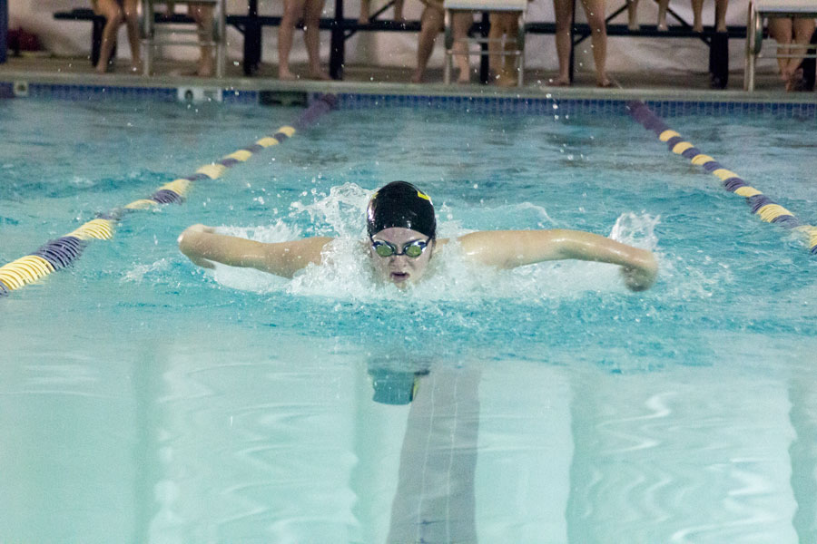 Sophomore Katie Smith swims butterfly in the 200m IM at a meet at the Severn School. 