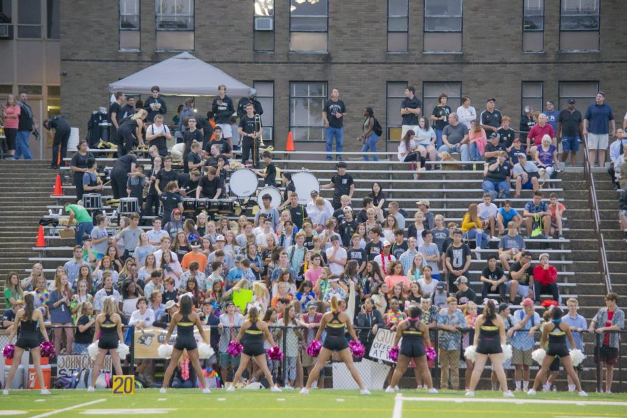A large group of students cheer on the varsity football team at a home game against Edmondson High School on Friday, Sept. 22. Student support like this, however, is not always visible at events of under-recognized teams.