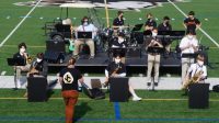 In-person spring concert begins outdoors on field