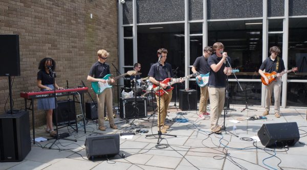 Rock band members tour local schools in the spring