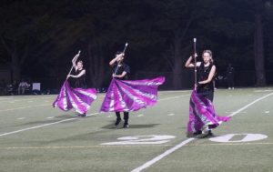 Color guard enhances performance of marching band